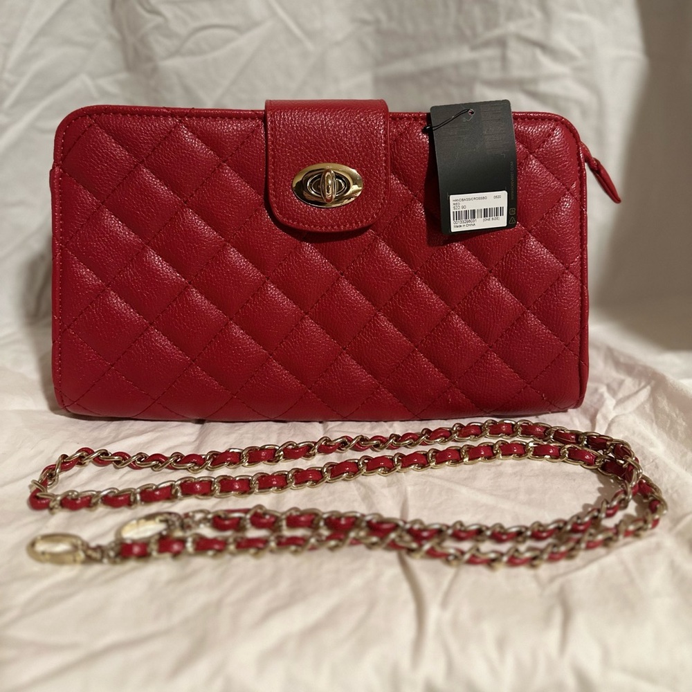Brand new faux red leather quilted purse with detachable chain.  NWT